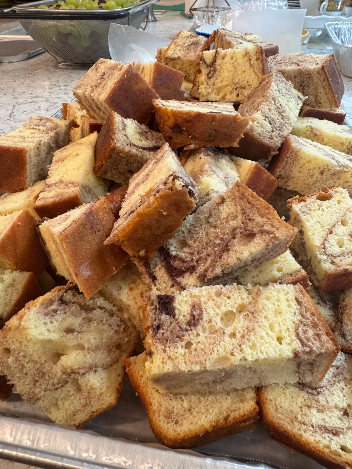 Marble pound cake squares showing a chocolate swirl